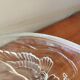 Art deco cup in pressed glass paste
