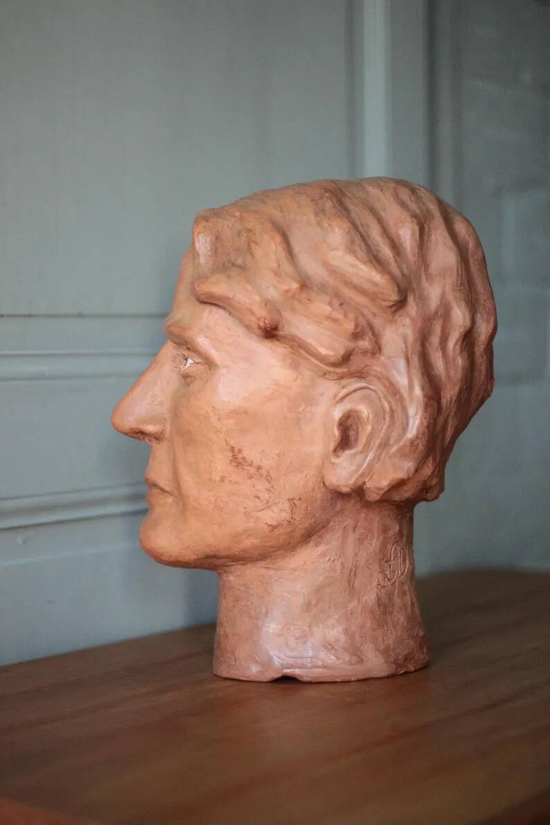 Sculpture signed Doloire, terracotta sculpture, sculpture of a man's head, collection, interior decoration.