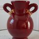 Vase St Clément bordeaux et doré années 50