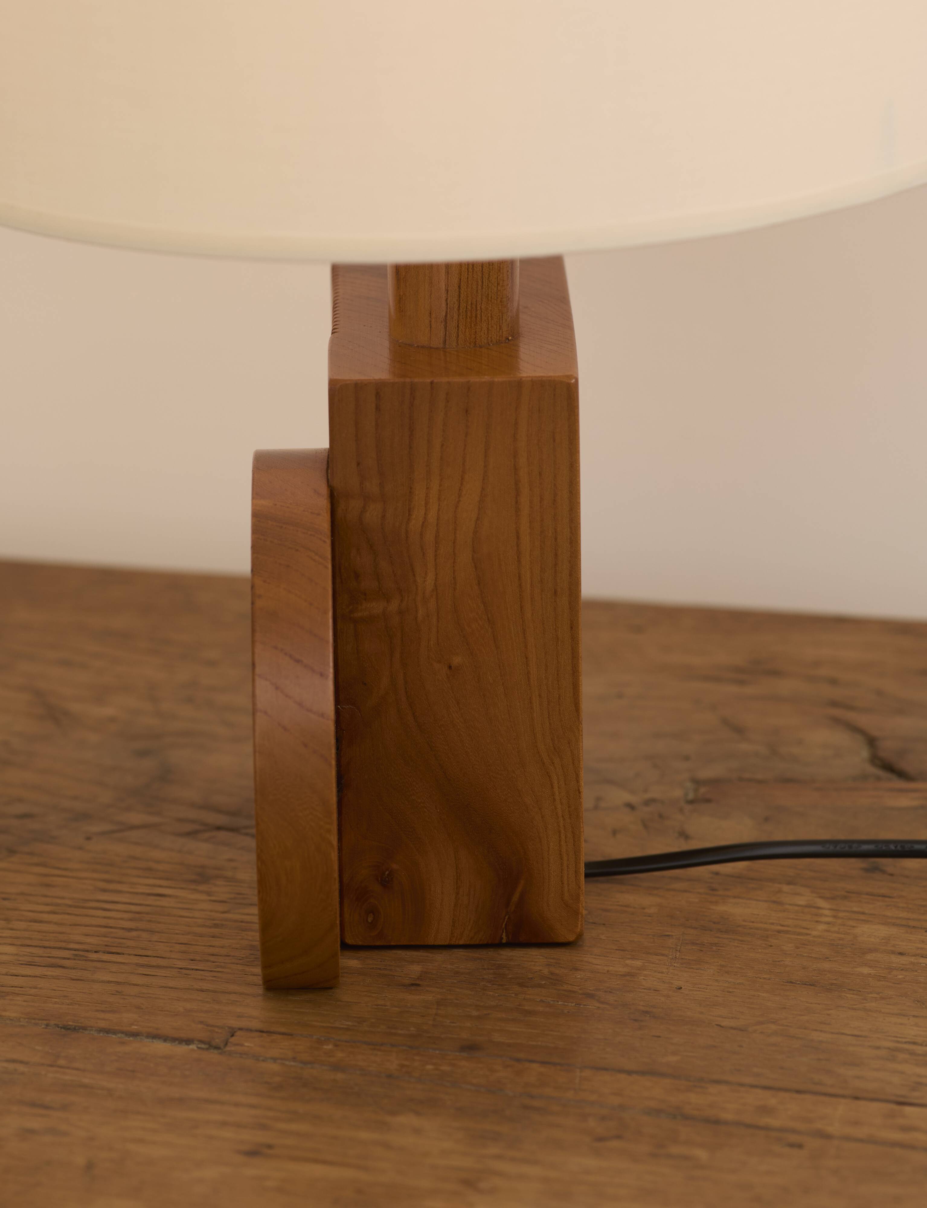 Pair of geometric handcrafted lamps in solid oak circa 1970.