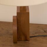 Pair of geometric handcrafted lamps in solid oak circa 1970.