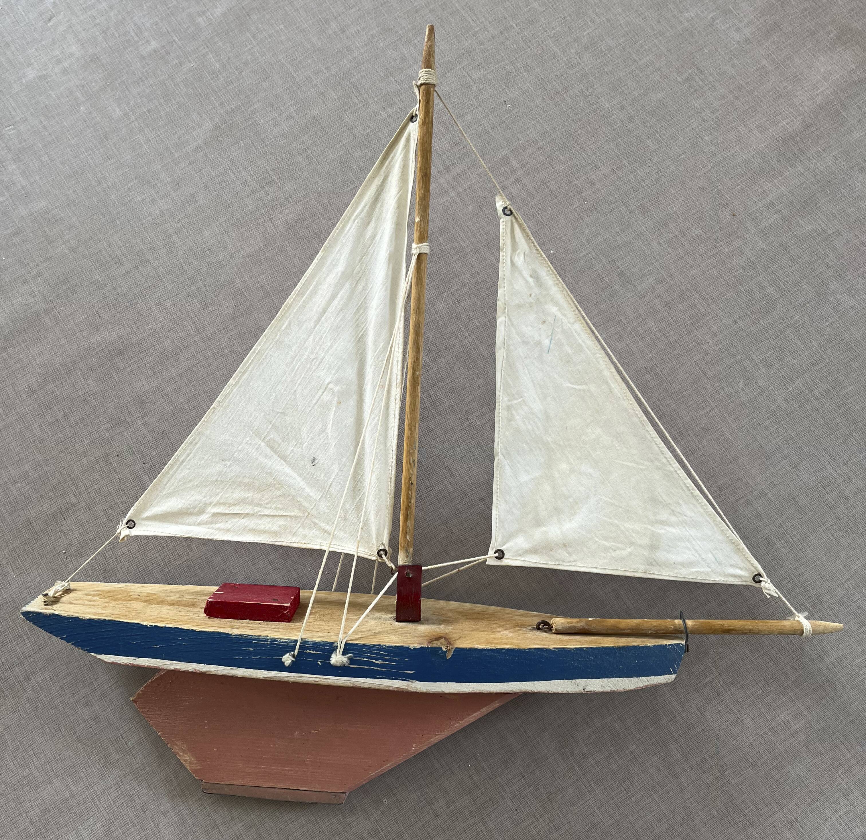 Navigable wooden basin sailboat, toy attributed to the jab granville brand