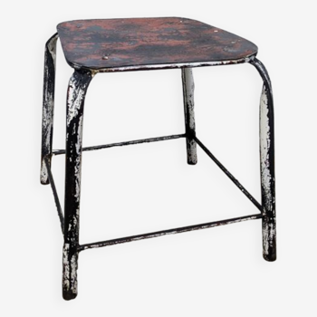 Patinated iron stool