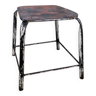 Patinated iron stool