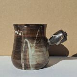 Stoneware pitcher signed by Jacques Pouchain.