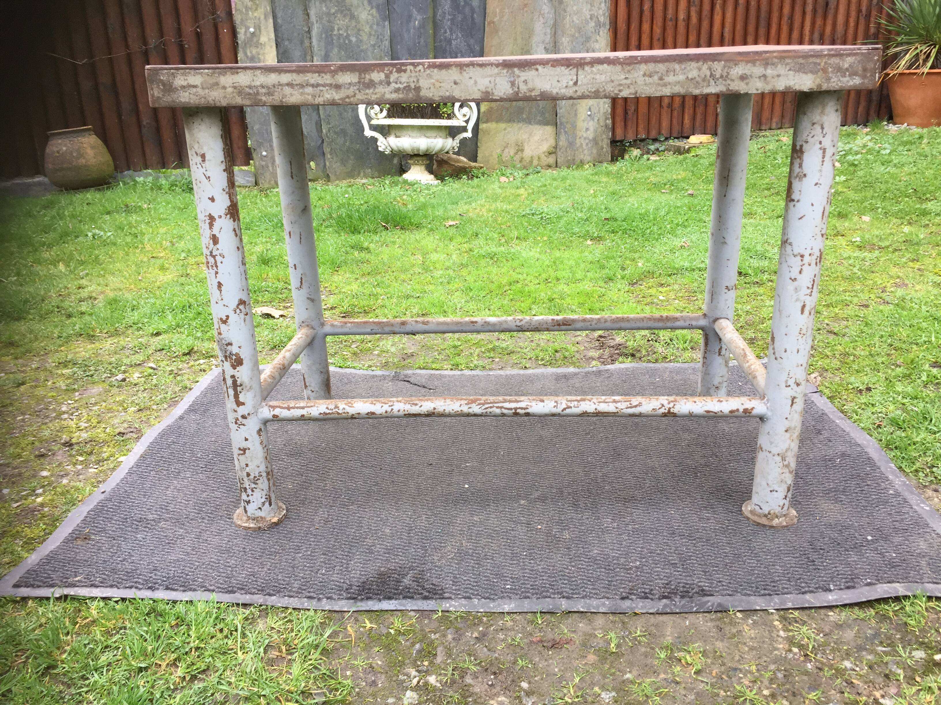 Vintage metal table from an industrial workshop for a makeover