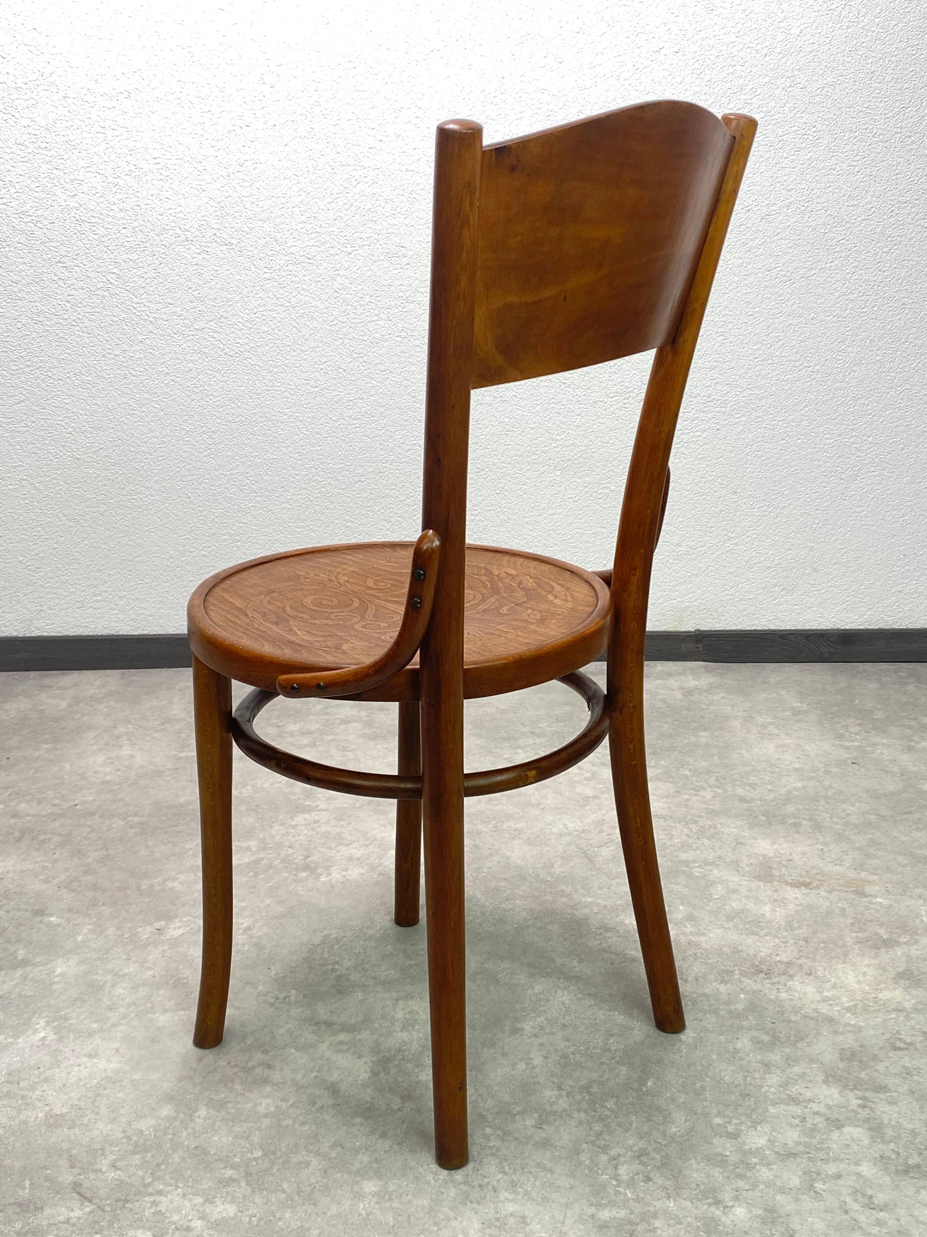 Set of 4 dining chairs by Thonet Mundus