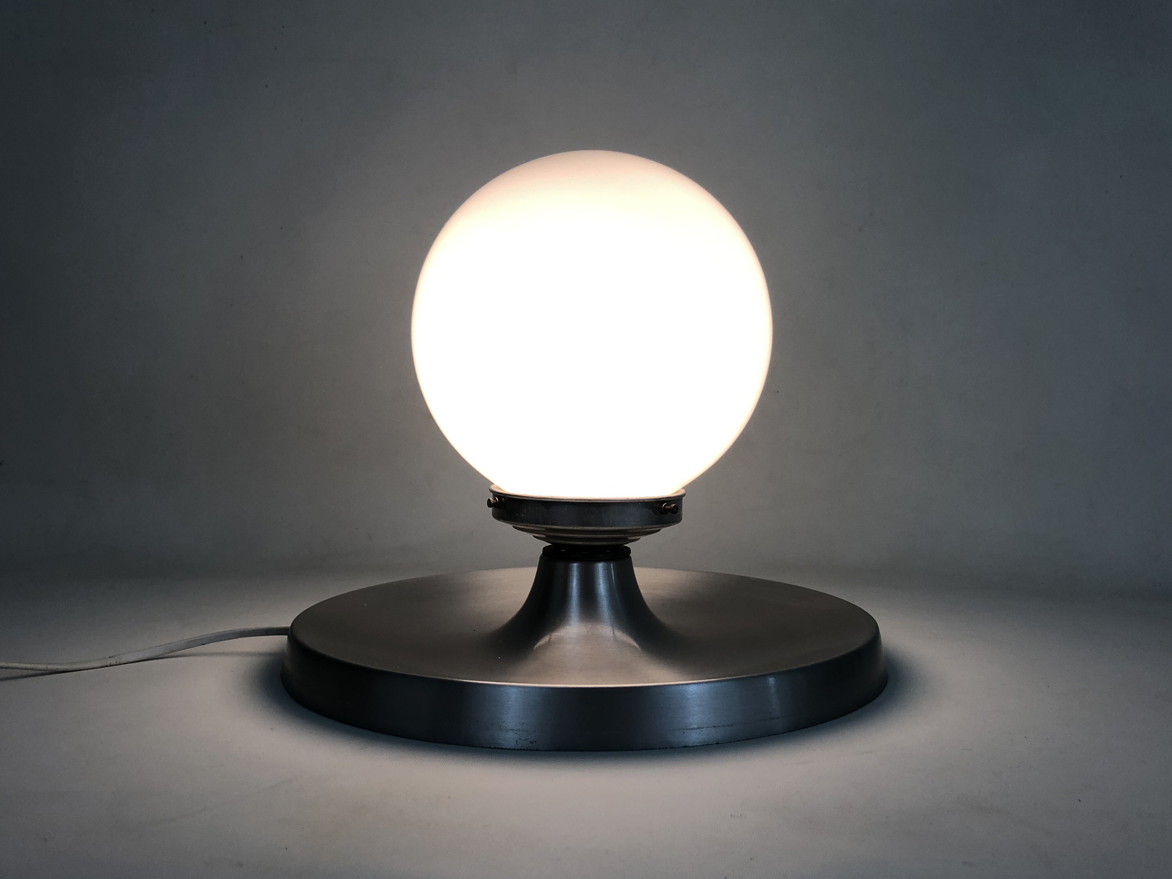 Brushed metal bedside lamp and white opaline globe, year 70
