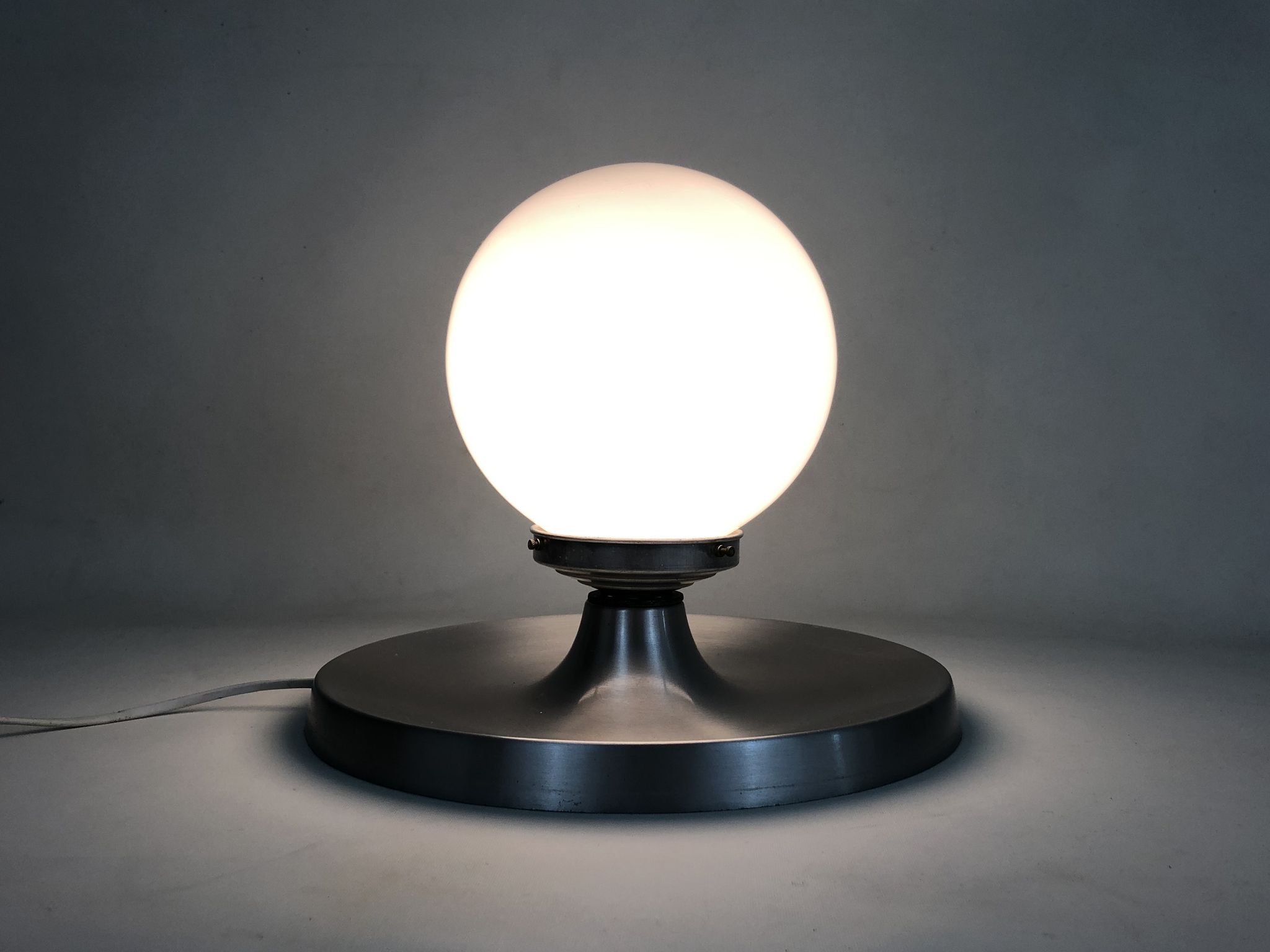 Brushed metal bedside lamp and white opaline globe, year 70