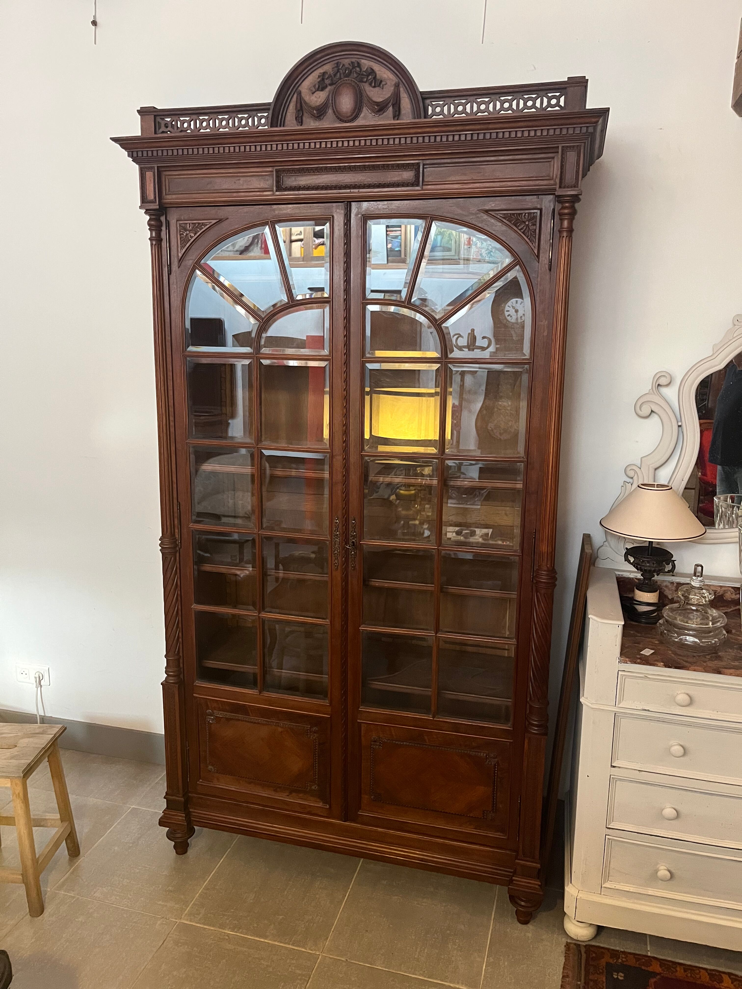 Louis XVI style beveled glass bookcase