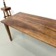 Farm table in walnut with spindle legs.
