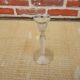 Old twisted transparent glass candlestick