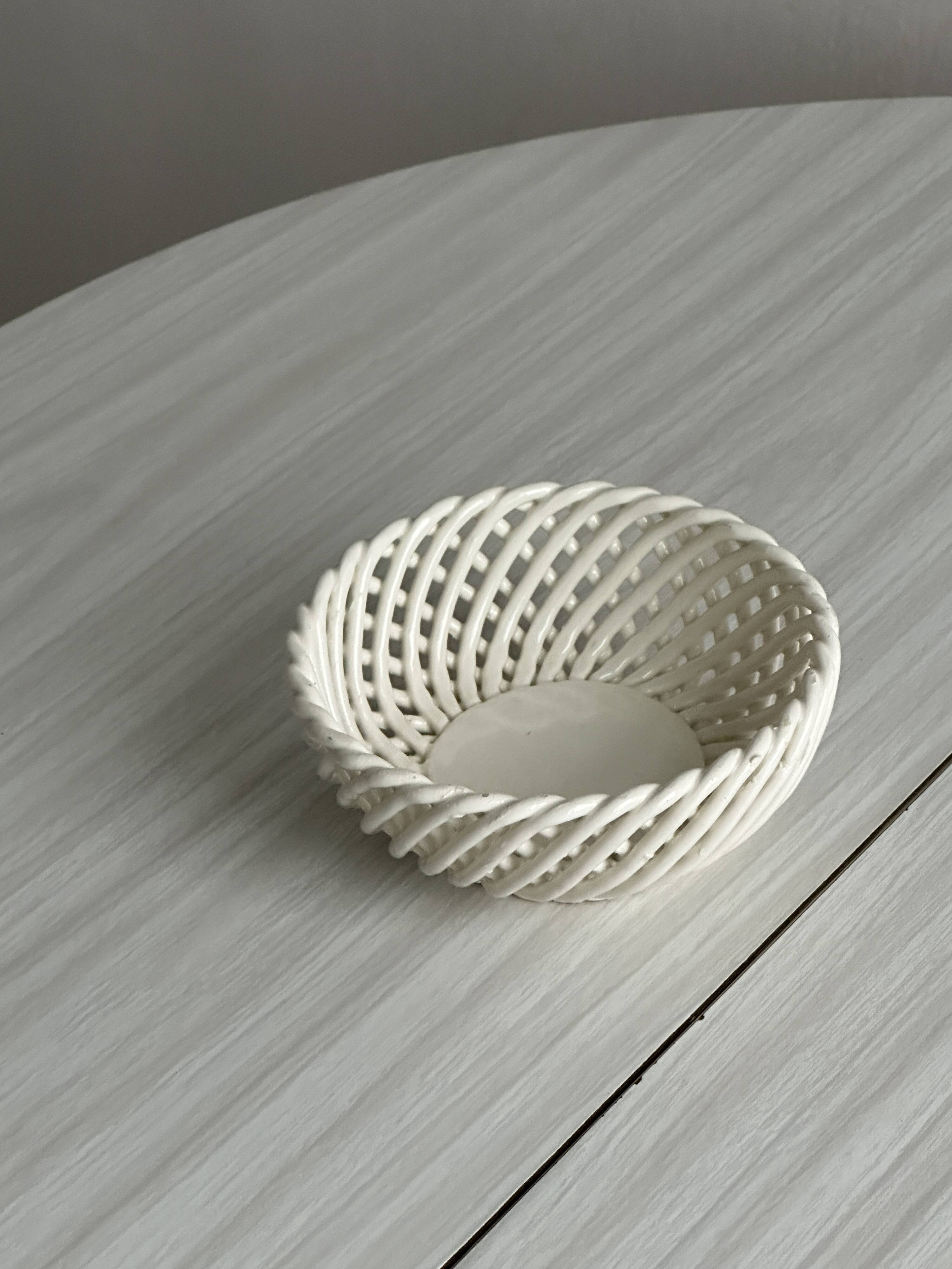 white openwork ceramic cup