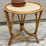 Round coffee table in vintage rattan