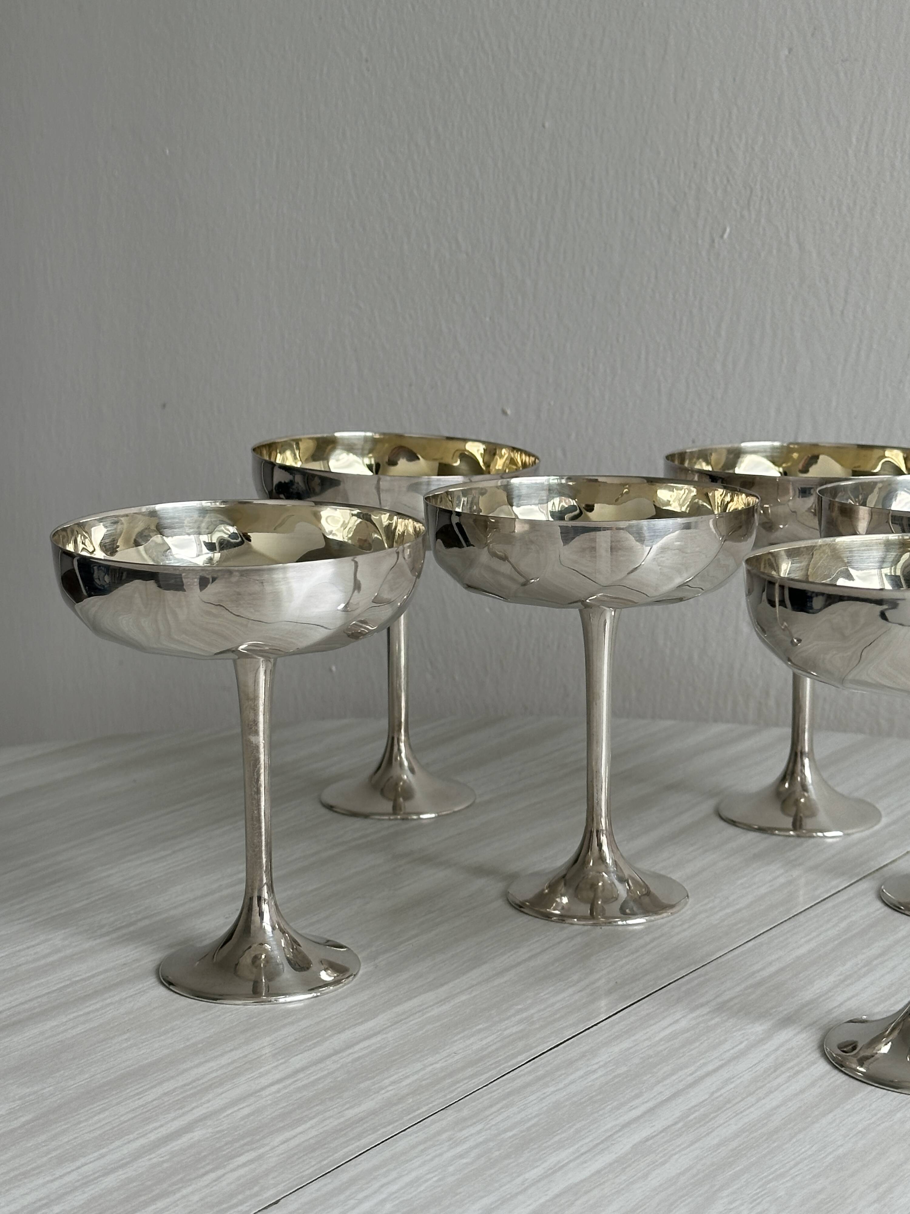 6 shiny metal footed bowls