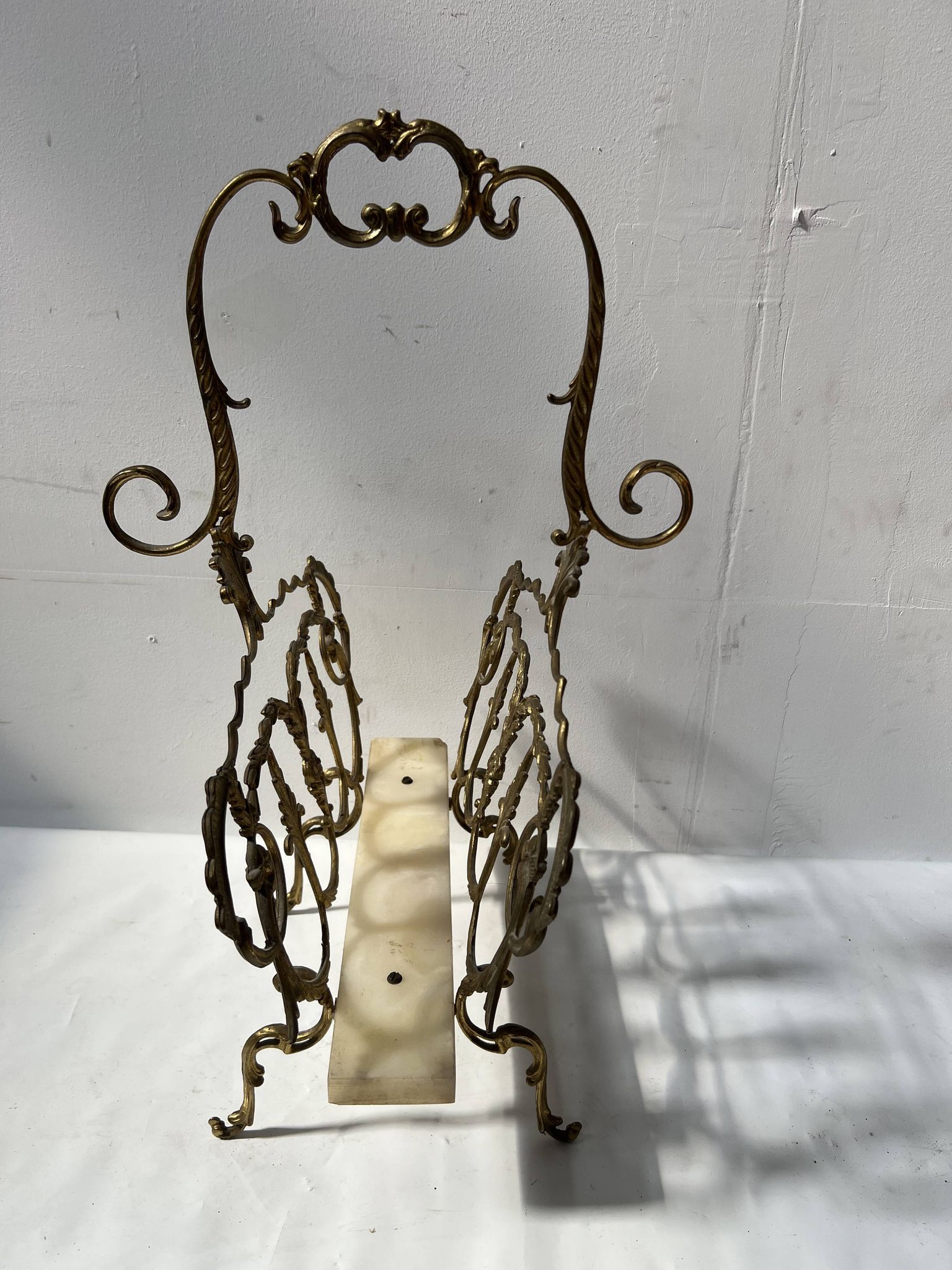 20th century openwork bronze and brass magazine rack