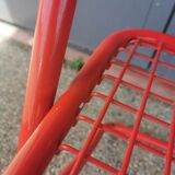 Vintage red metal folding chair