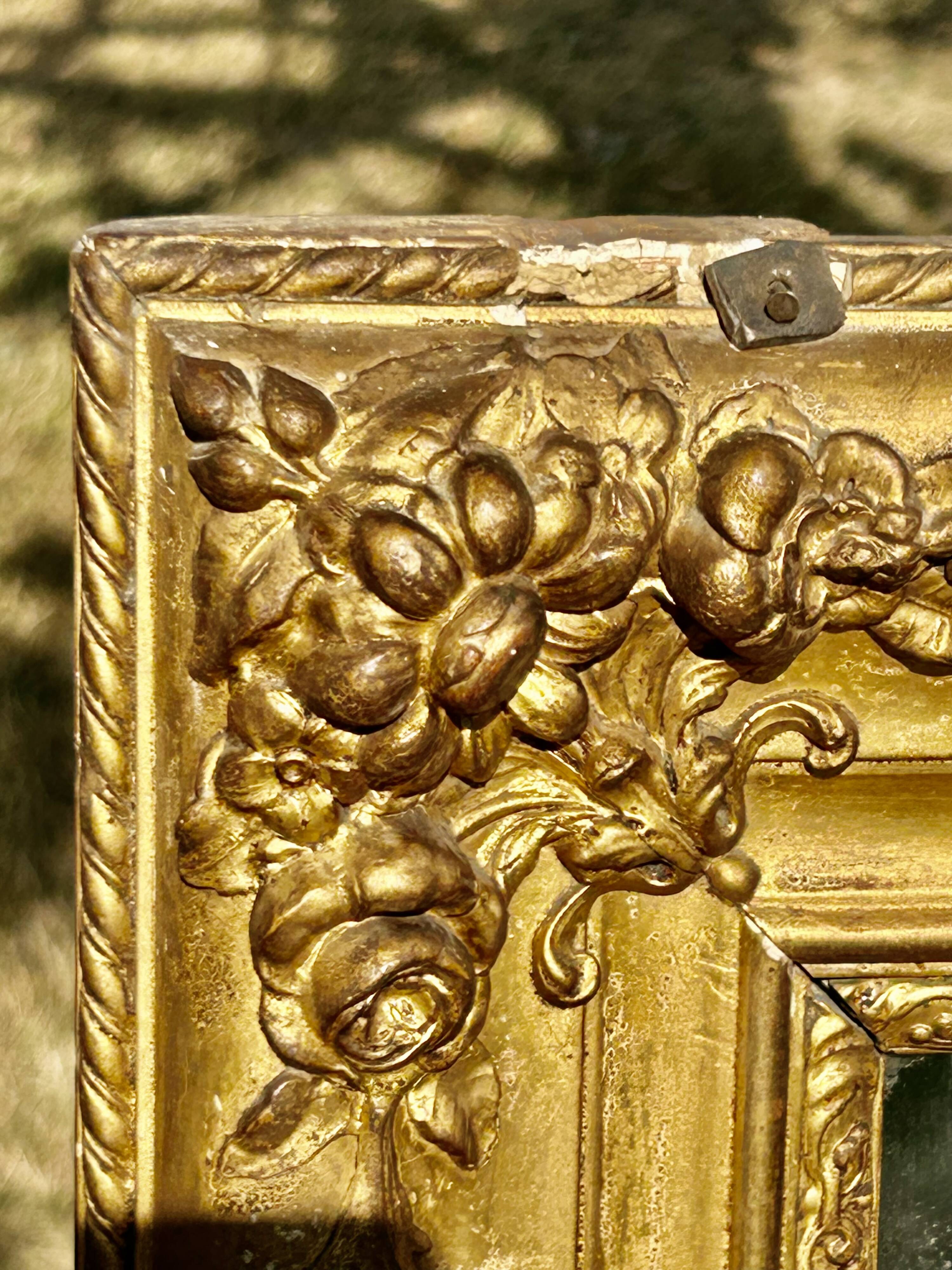 Grand miroir ancien doré à la feuille