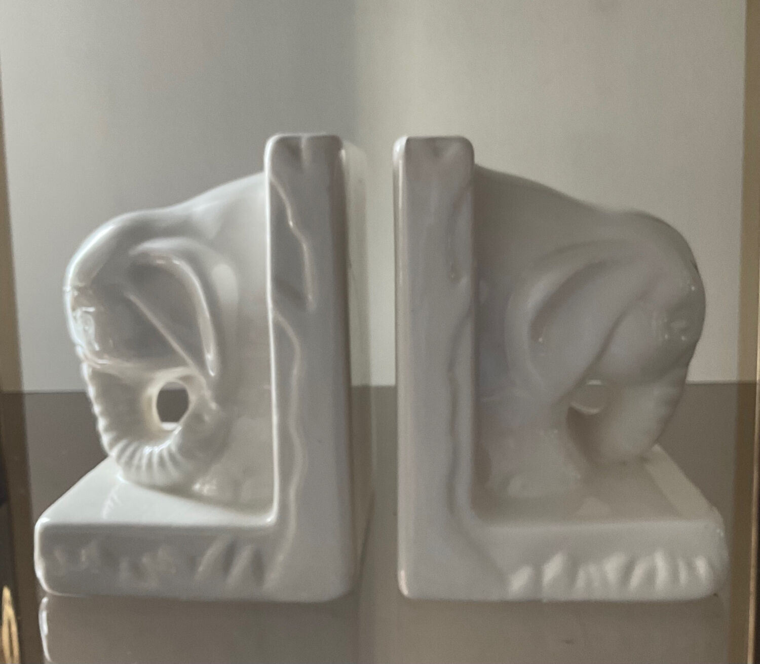 Pair of vintage enamelled ceramic elephant bookends