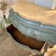 Renovated curved tomb chest of drawers in clay green and wood