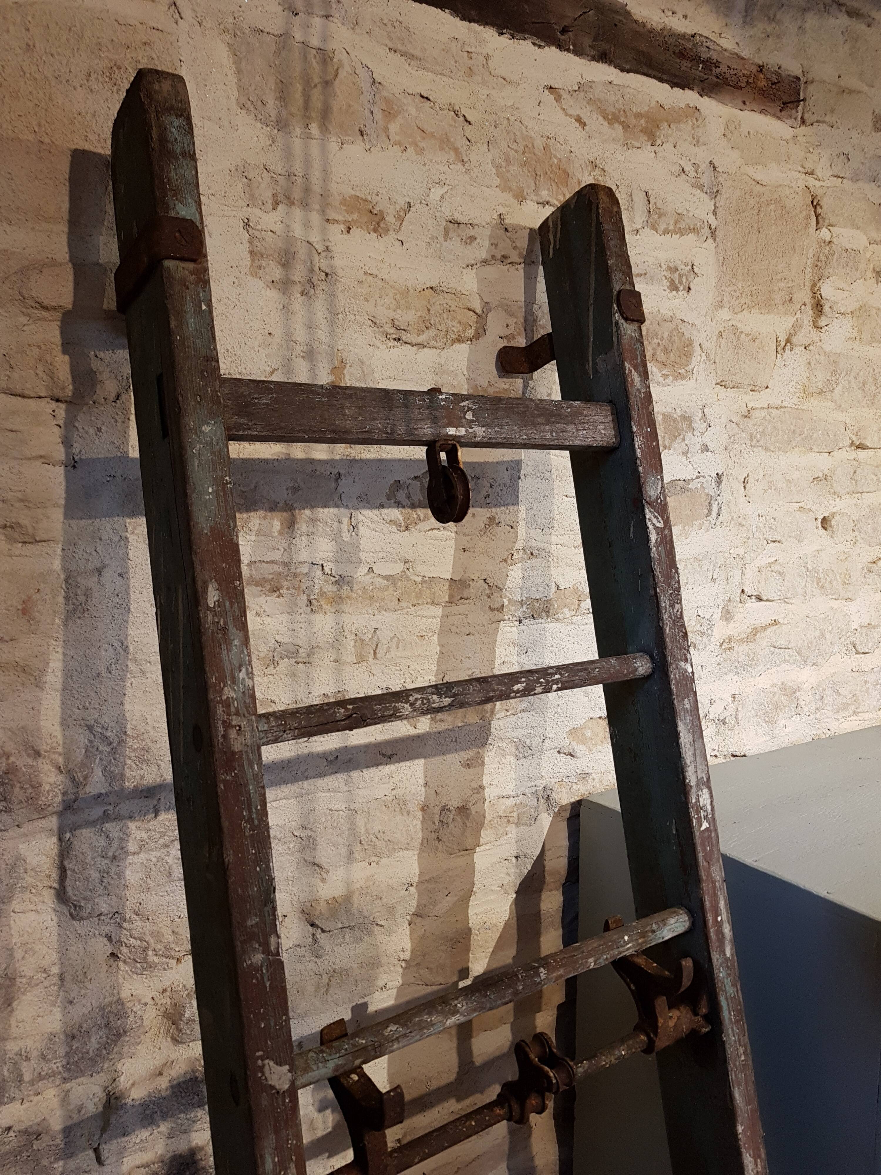 Former large scale wooden to the green patina