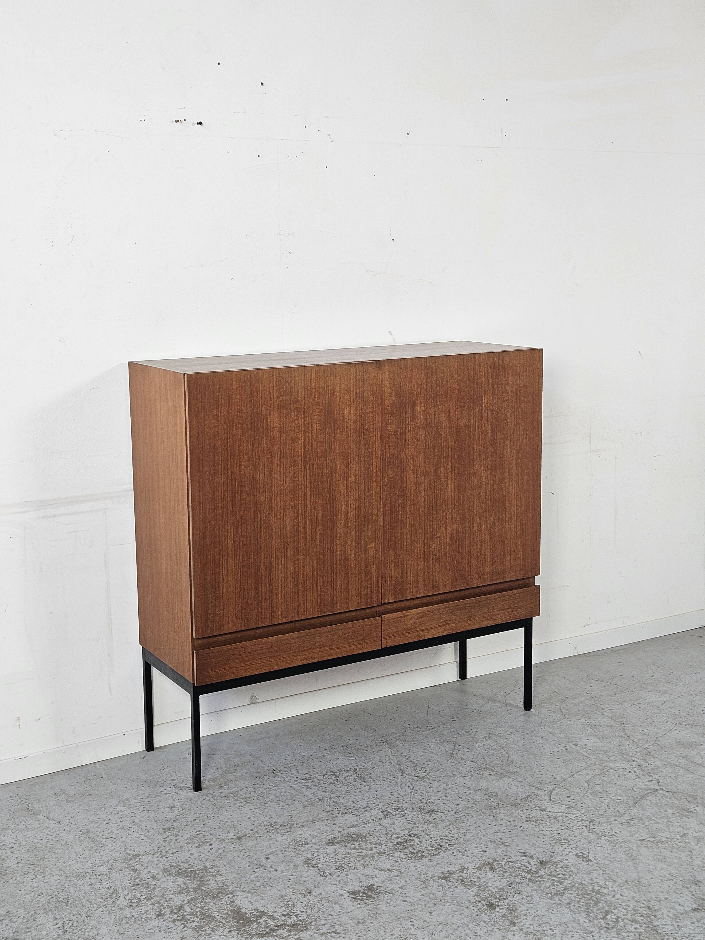 S21 highboard by Dieter Waeckerlin in teak, 1960s.