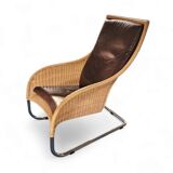 2 x Weighty rattan lounge chair / brown leather 1990s  Very good condition