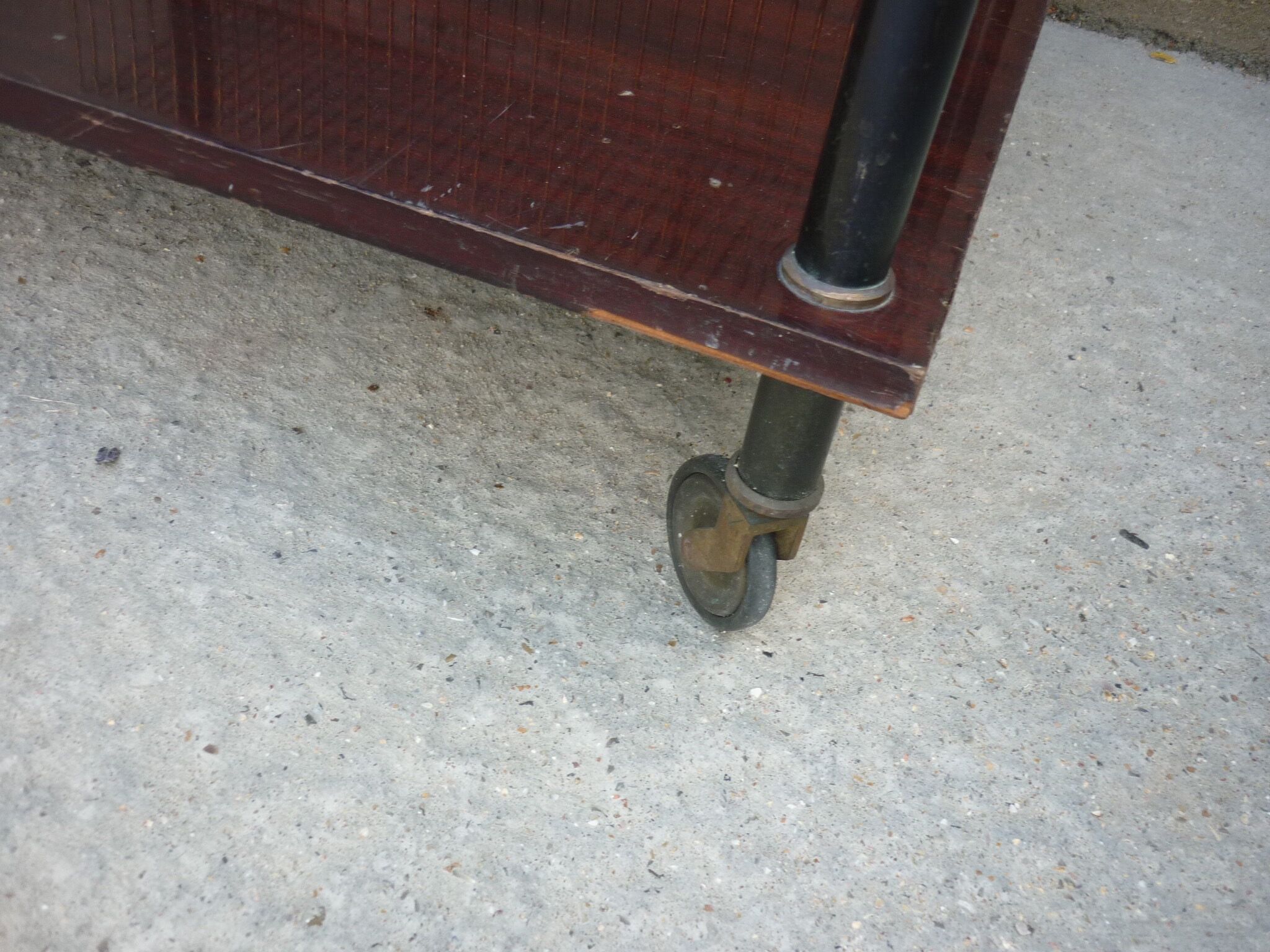 Wooden vintage table on wheels