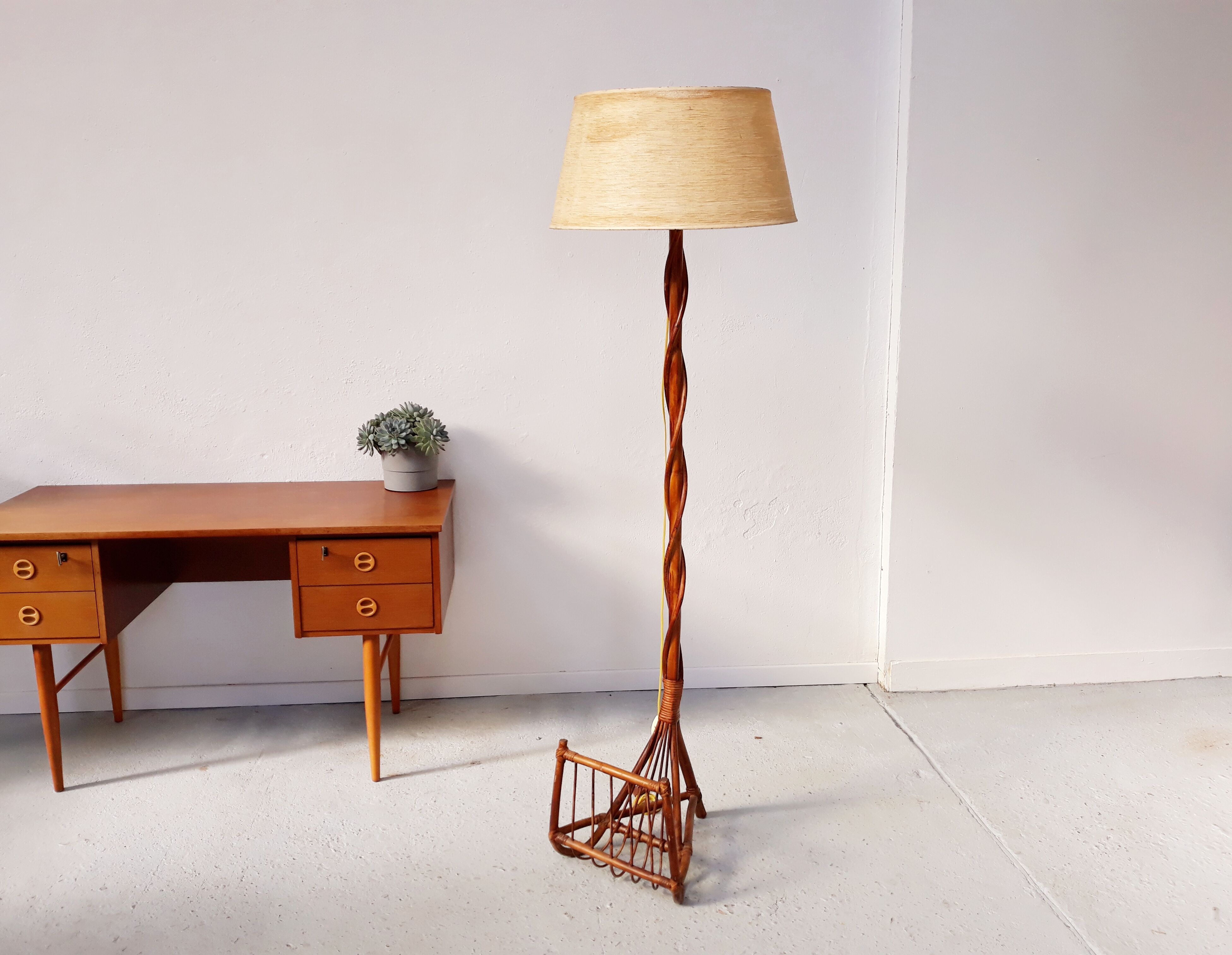 Lamppost wears vintage rattan magazine