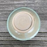 Large hollow serving plate in stoneware from the Blanot pottery.