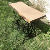 Cast iron and solid wood side table