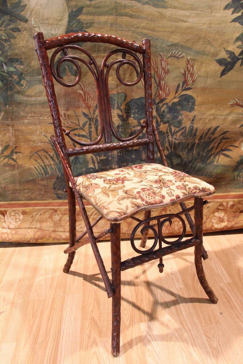 Folk art chair, black forest in branches