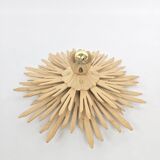 Giant sunburst wall lamp