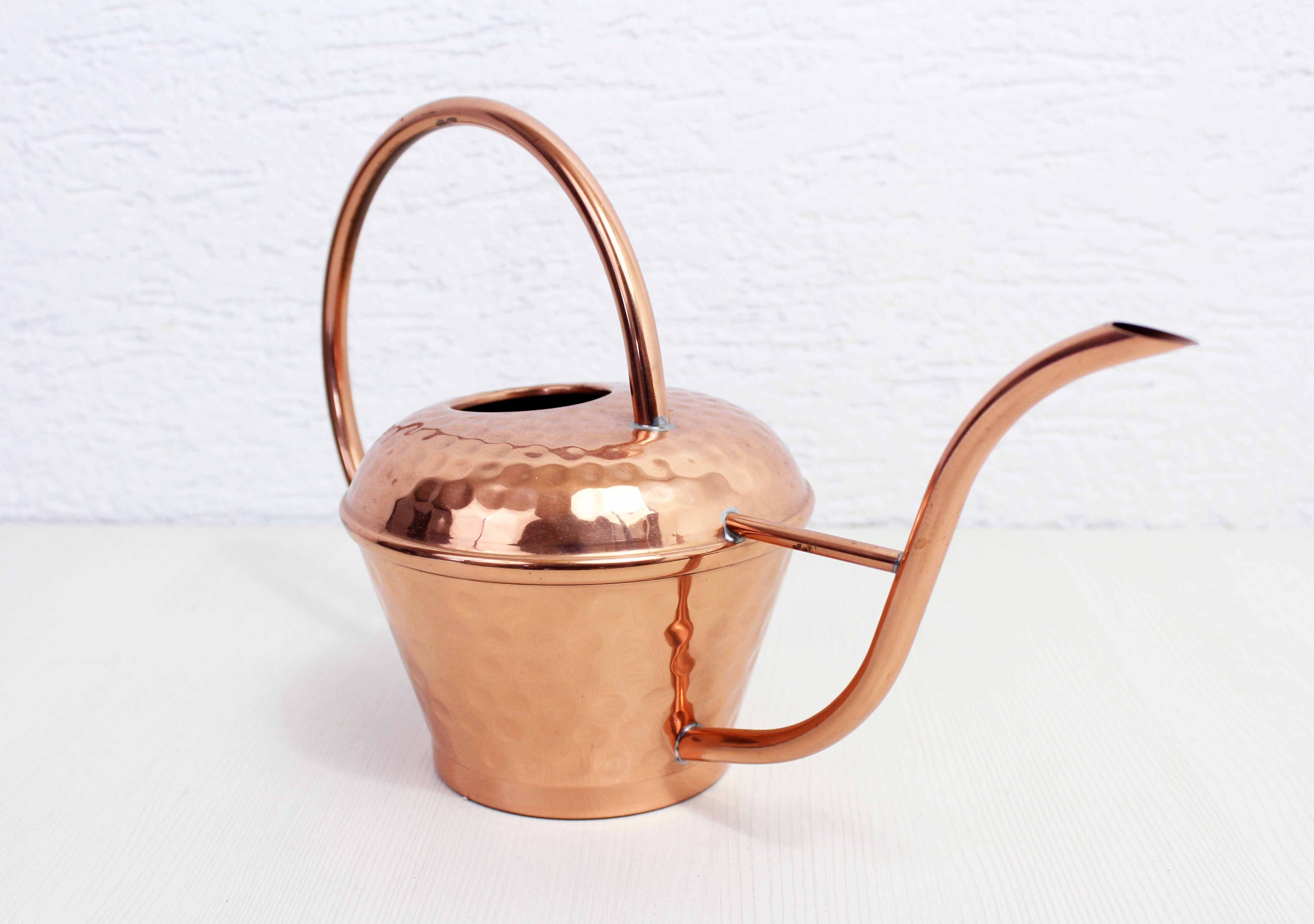 Vintage copper watering can