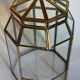 Indoor greenhouse-terrarium in brass