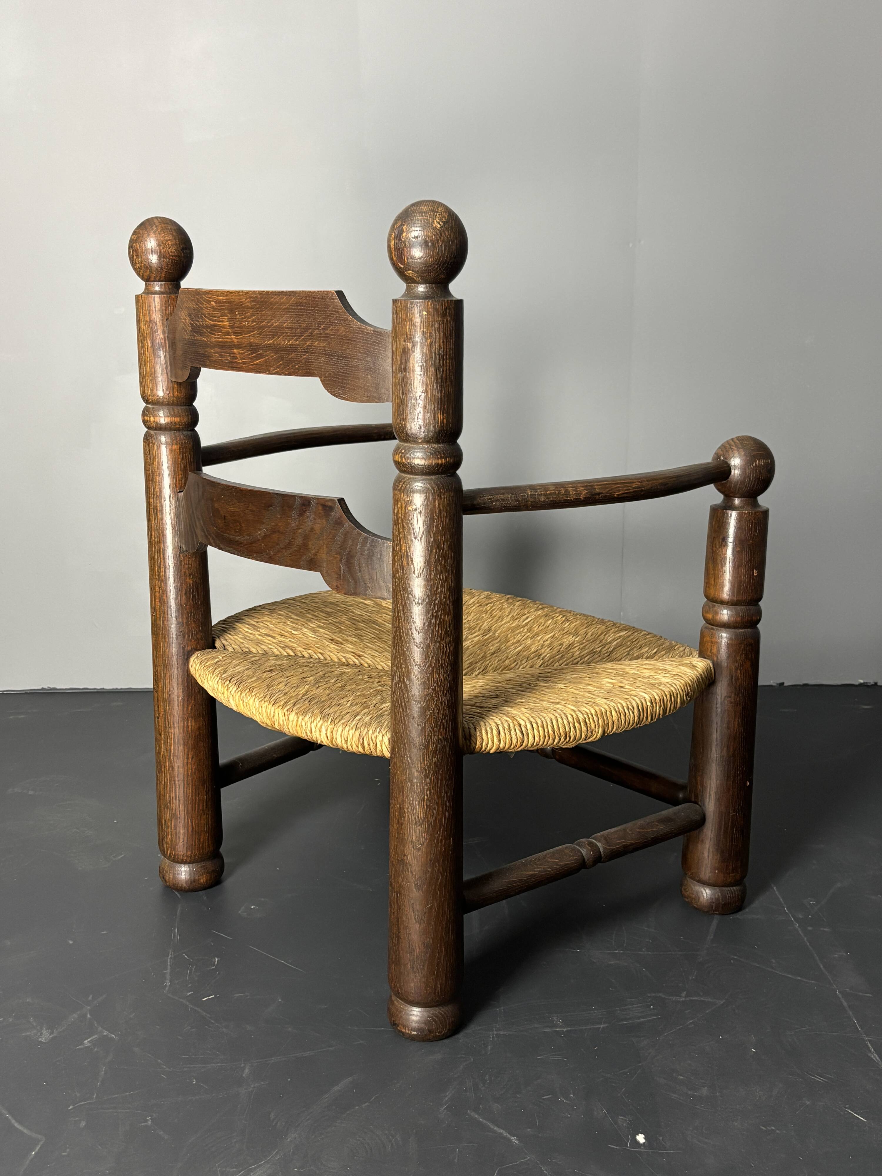 Brutalist French low rush oak side armchair by Charles Dudouyt ca 1940s