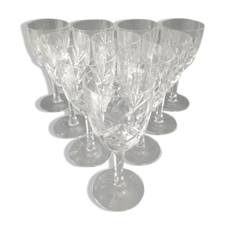 Crystal cut water stemmed glasses. Star and leaf patterns.