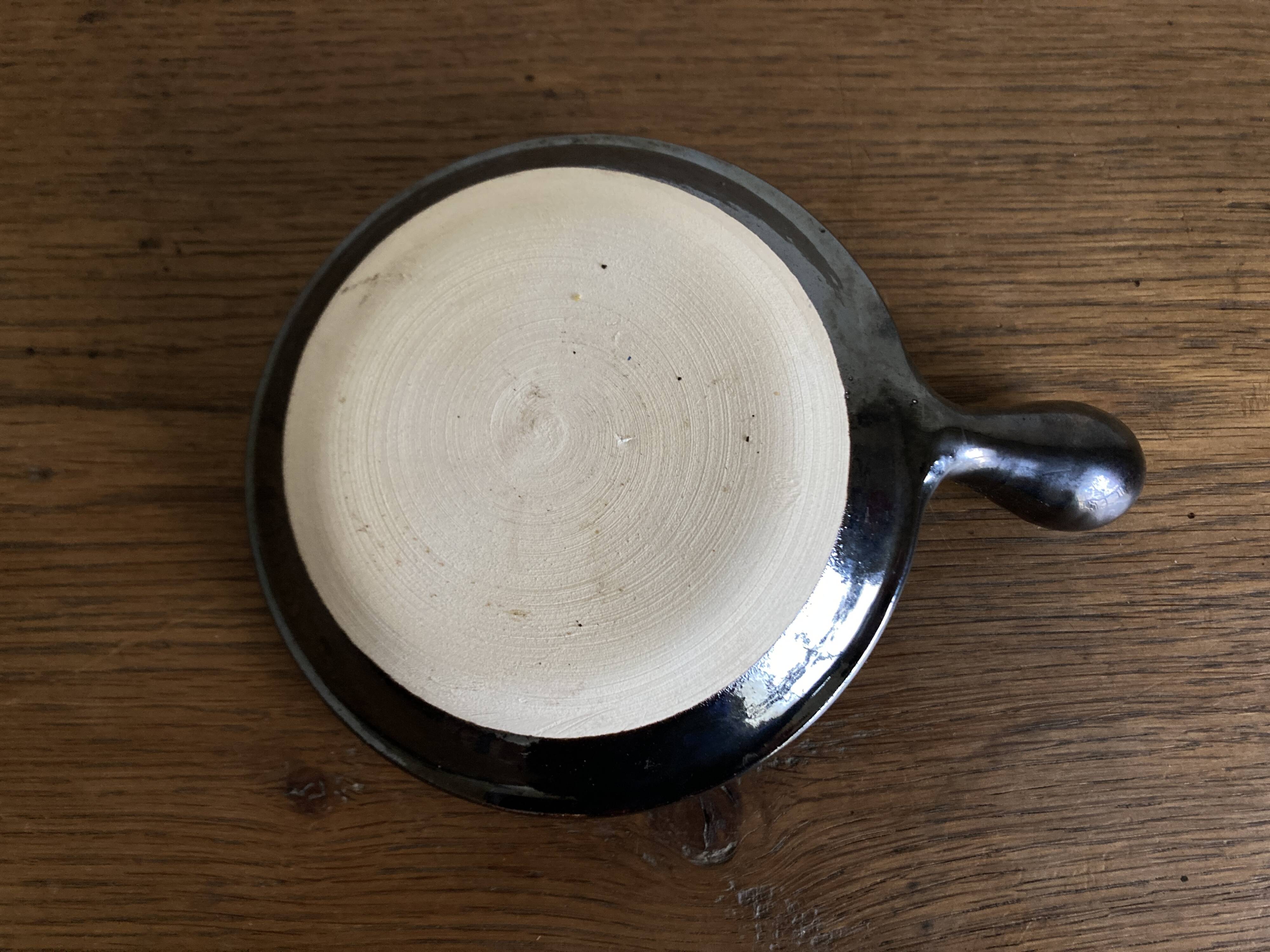 Black glazed earthenware dish 1960