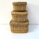 Vintage trio of small rattan nesting baskets