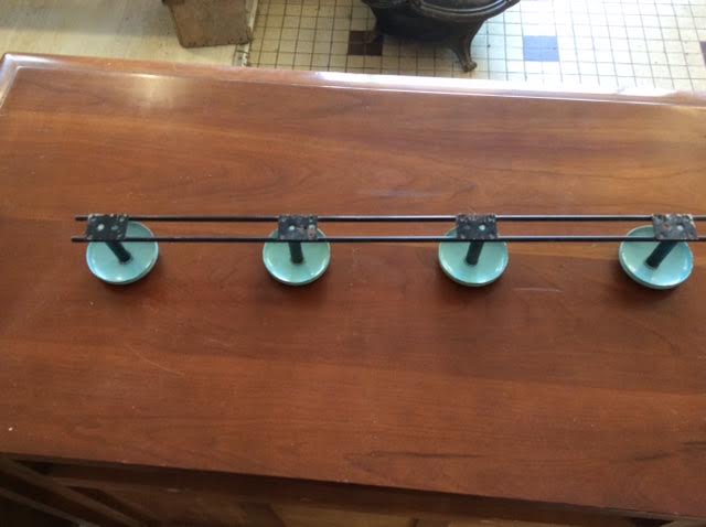 Iron hook with blue tip