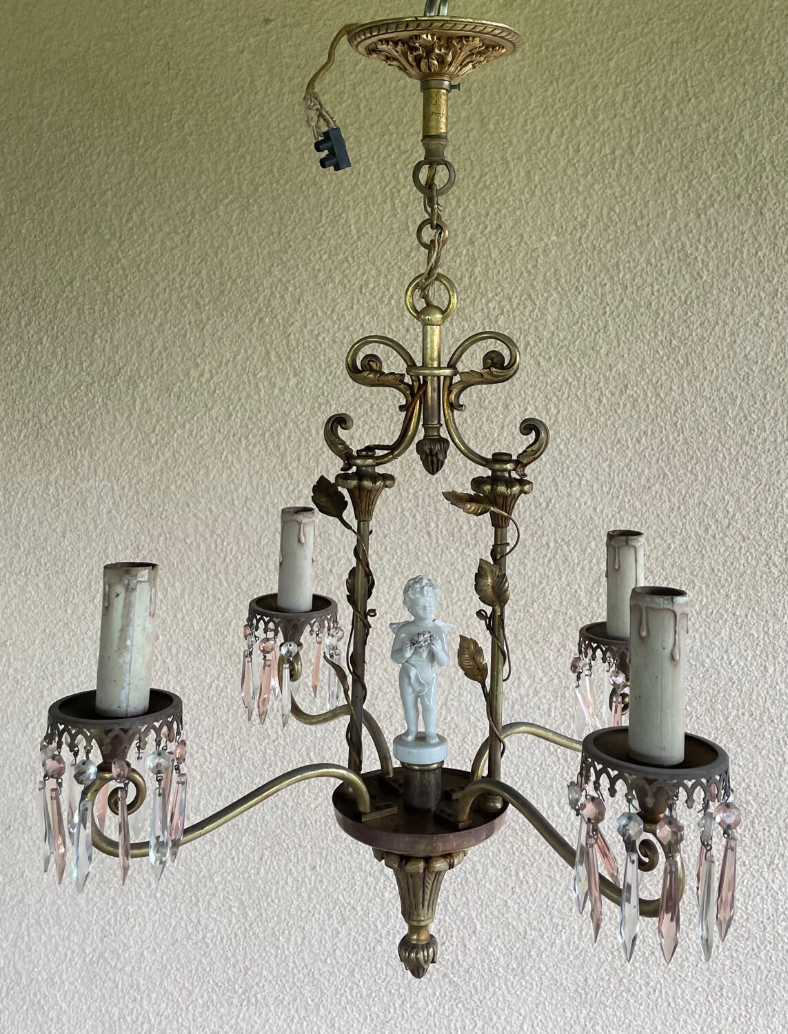 Antique bronze chandelier with porcelain angel.