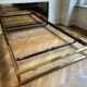 Belgo Chrom bed in gold metal and bronze mirrored headboard, 1970