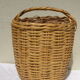 Basket has handles, braided vintage
