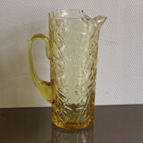 Pitcher in crumpled glass