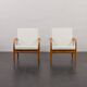 Pair of Kai Kristiansen Paperknife lounge chairs in teak and natural wool