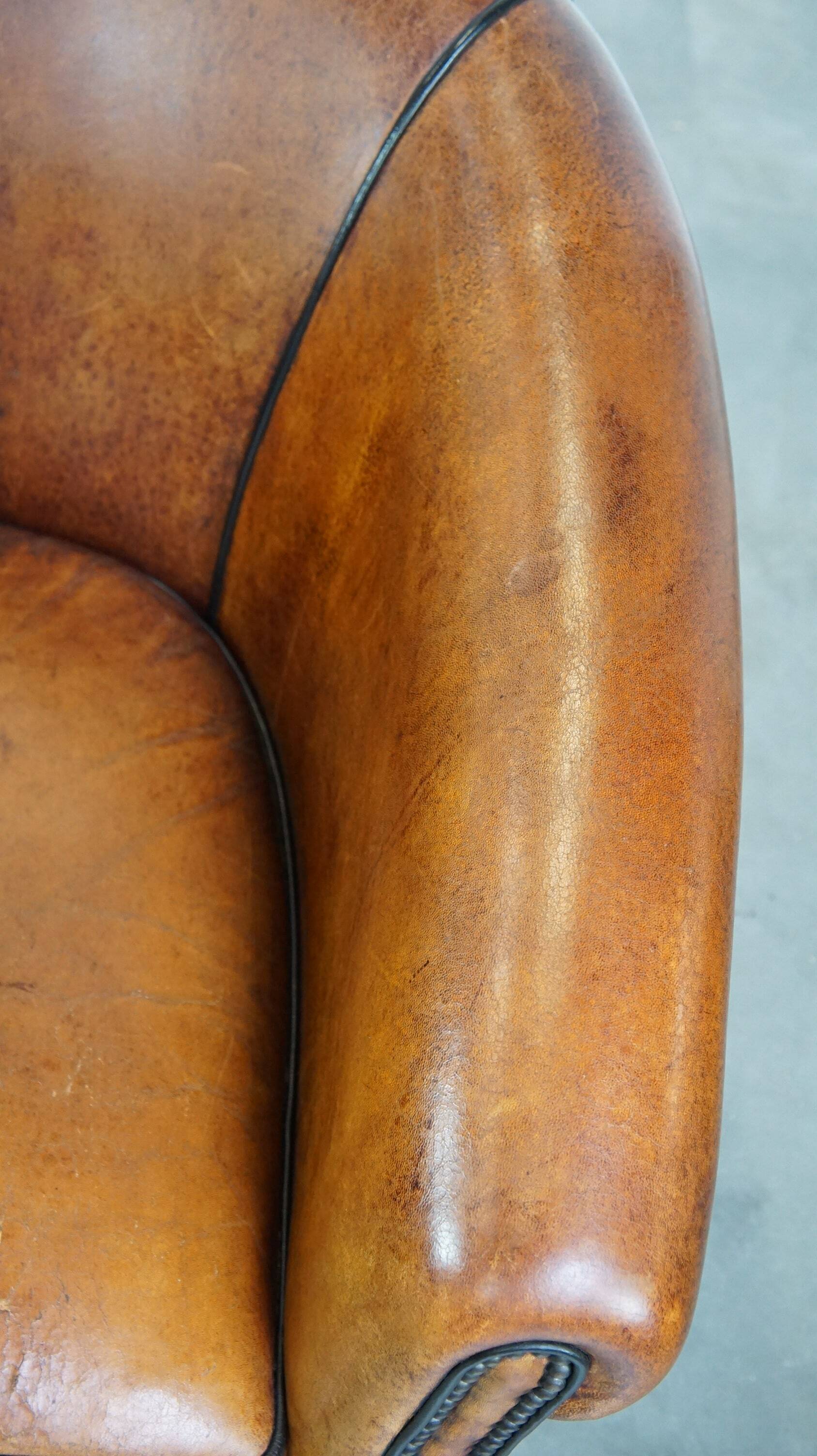 Fauteuil club vintage en cuir de mouton