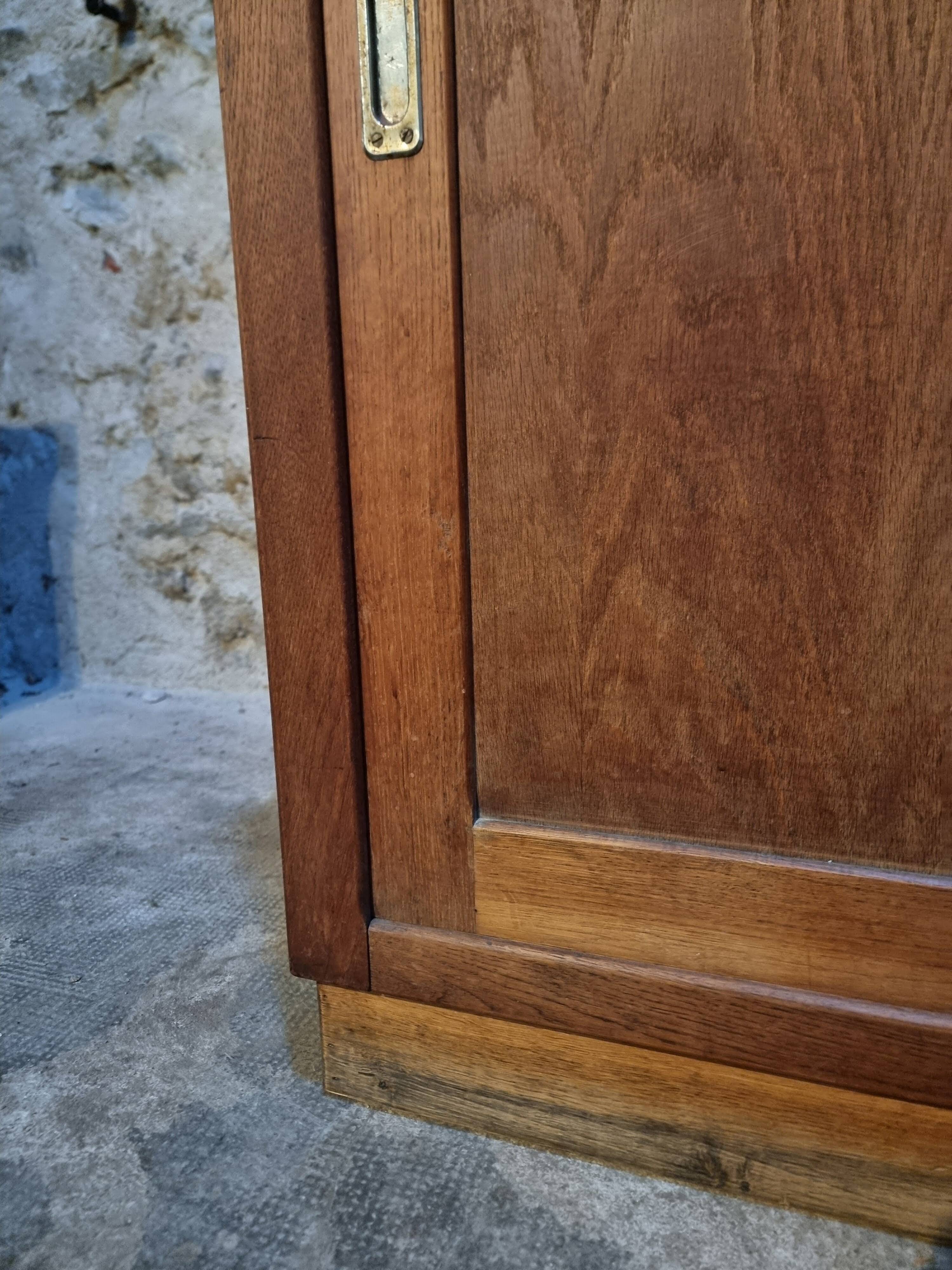 Oak sliding door wardrobe, 1920s