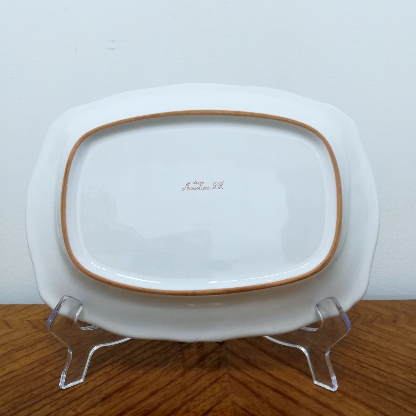 Earthenware dish signed Moustiers