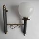 Empire style torch wall sconce