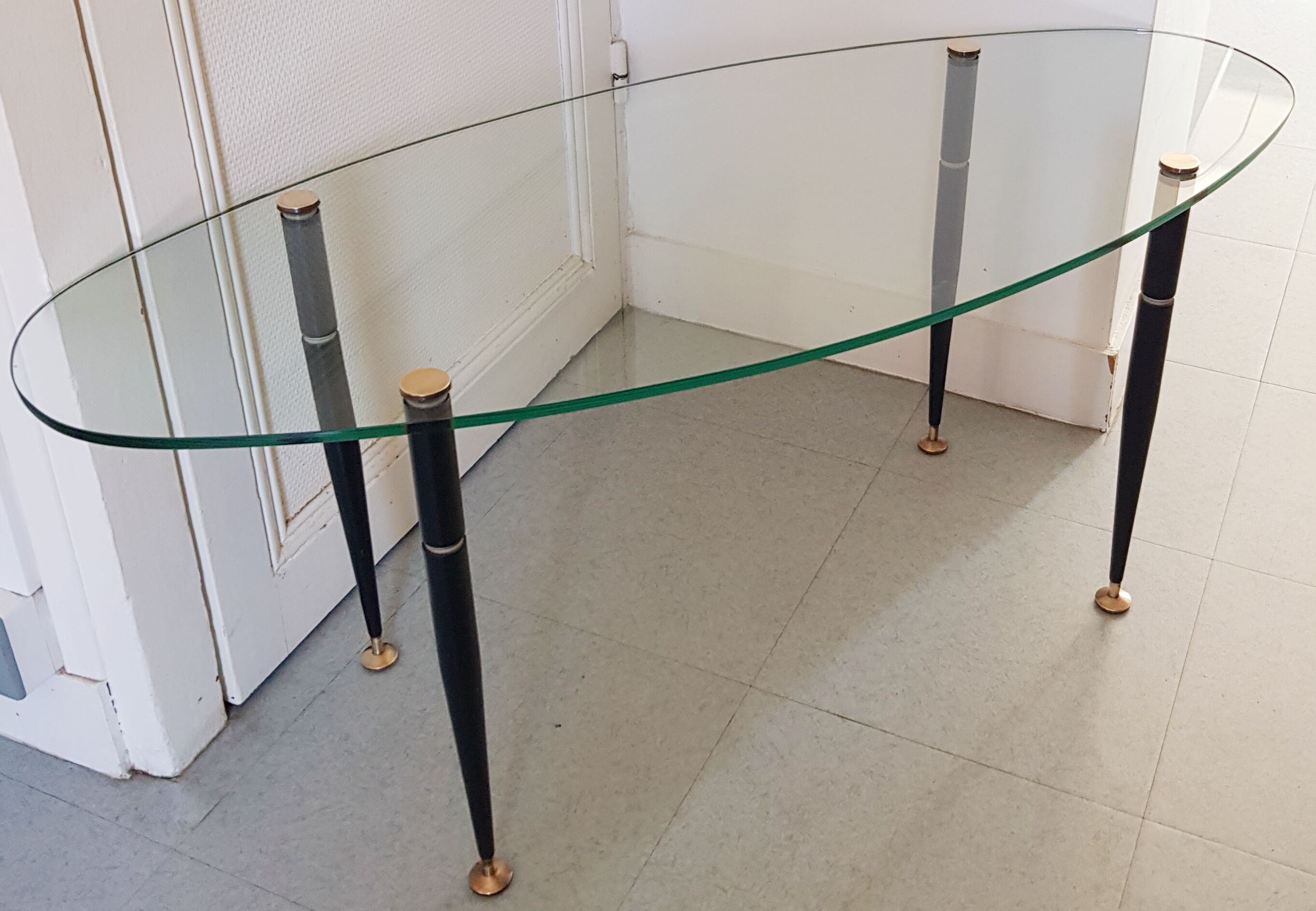 1950 oval coffee table in steel and brass glass
